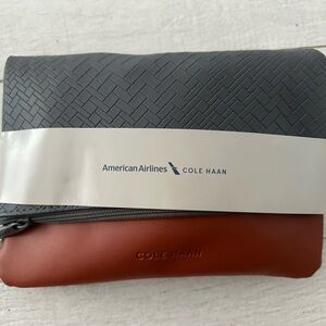 New Cole Haan Travel  case sealed .